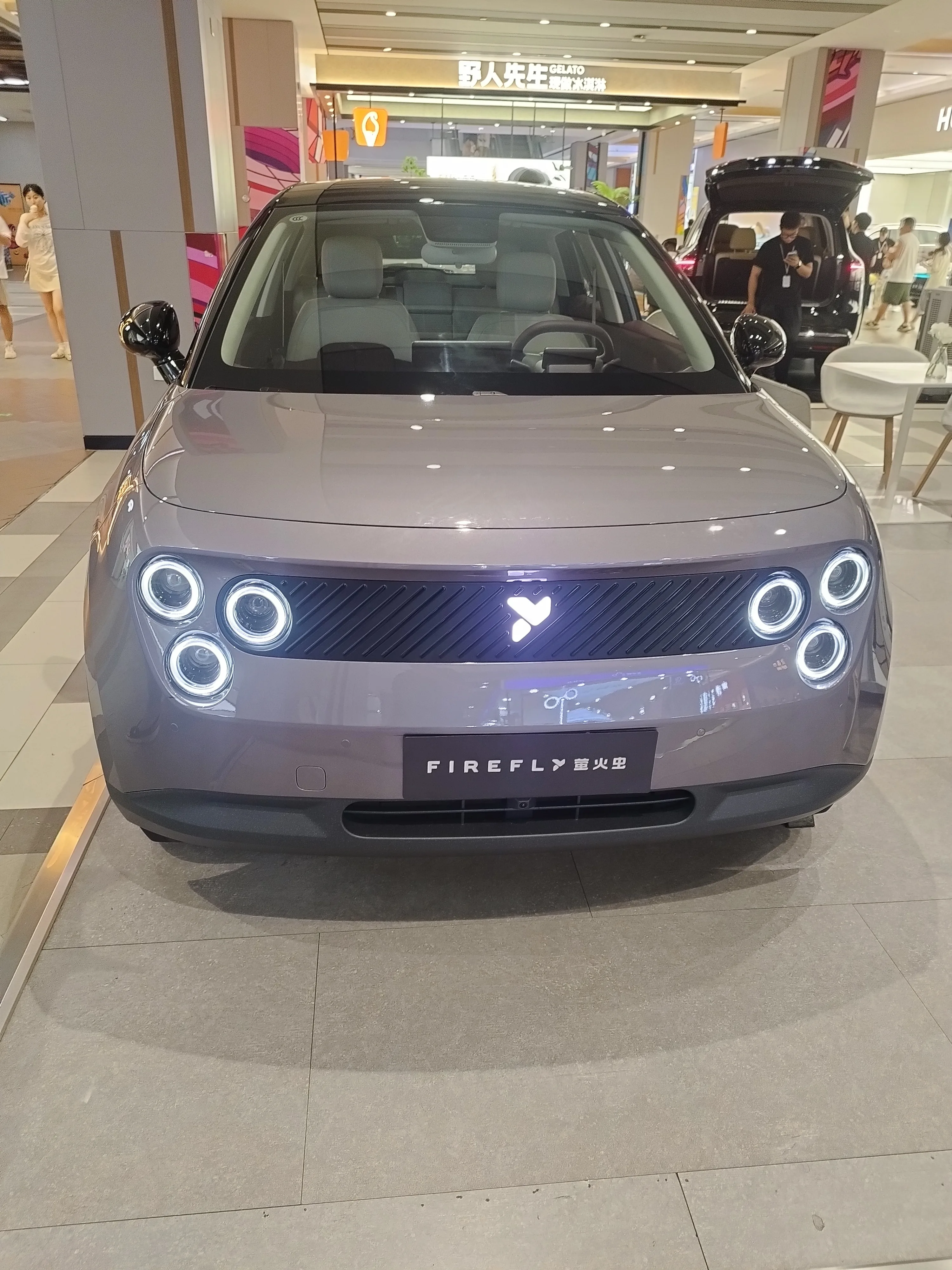 Firefly compact EV front view with distinctive ring headlights