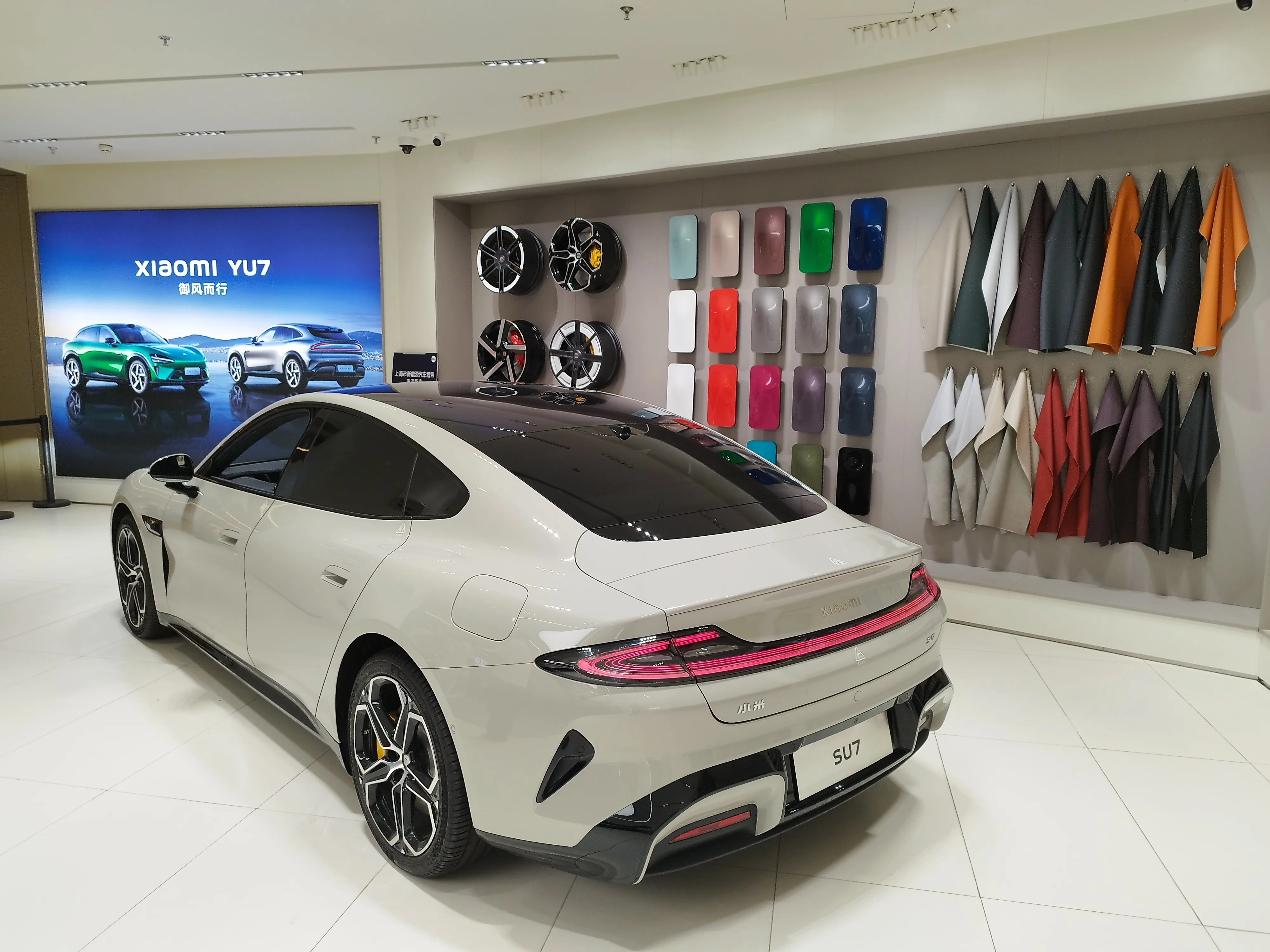 Xiaomi SU7 in a Shanghai shopping mall showroom