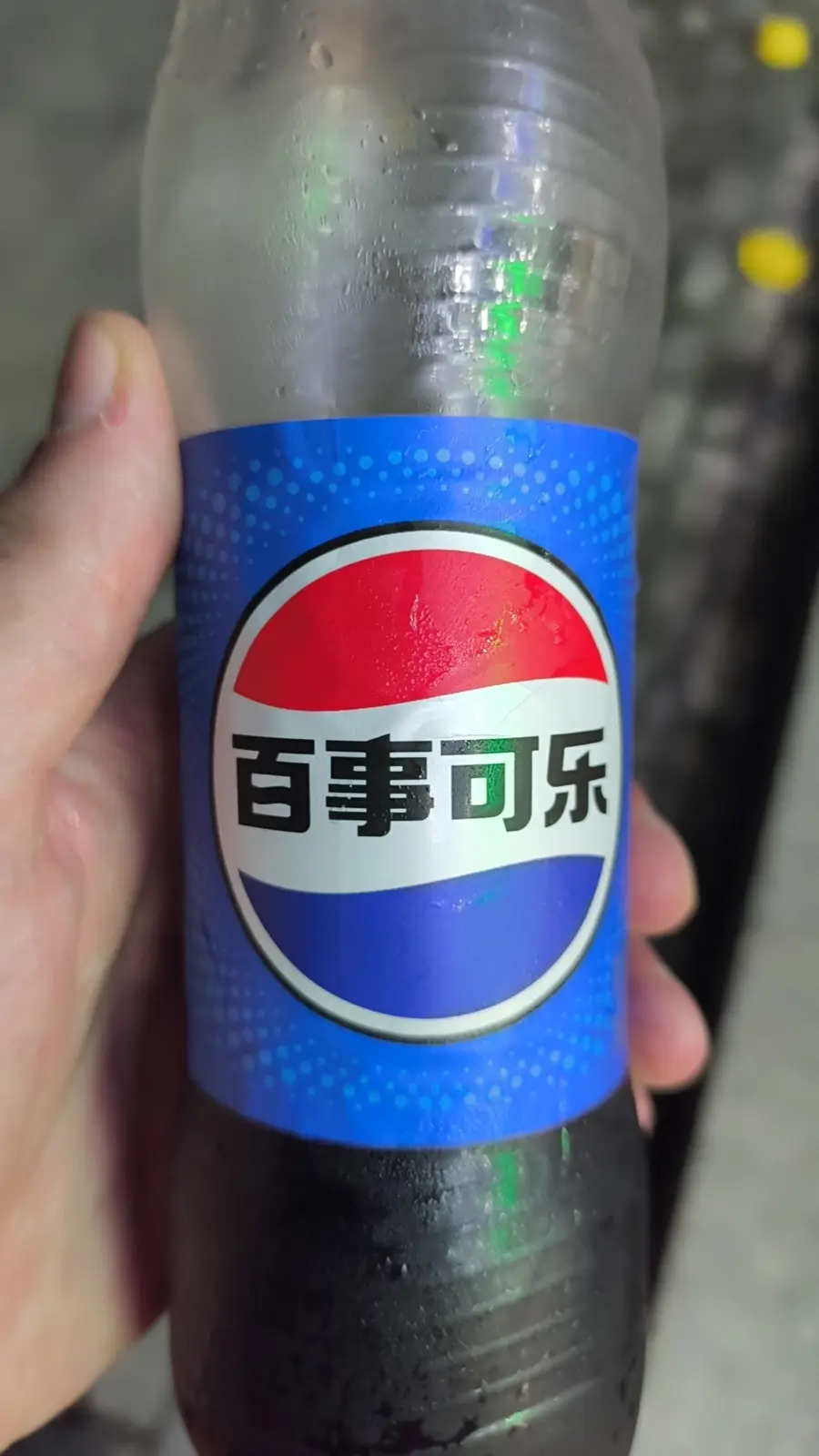 Pepsi branding, easy to recognize by logo alone in a Chinese supermarket